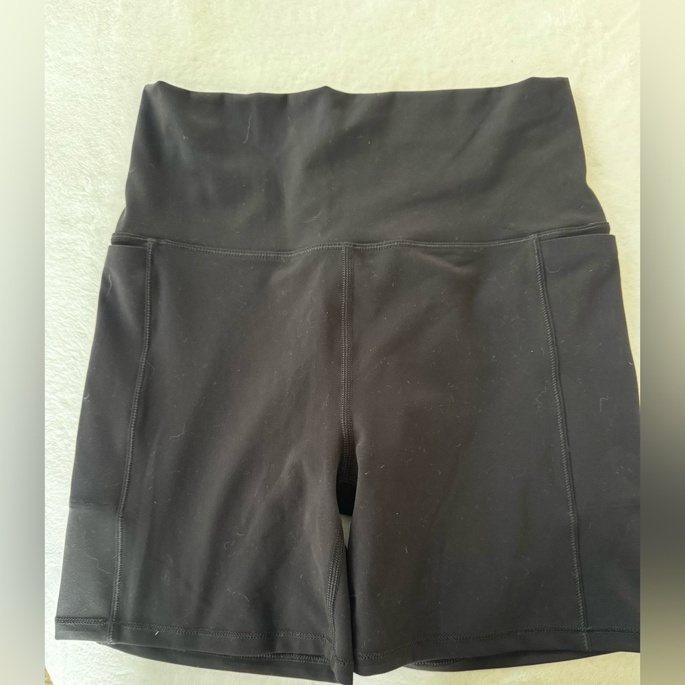 Women’s black Vuori clean elevation short